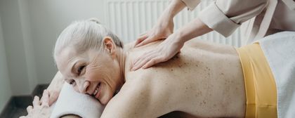 elderly man getting a massage